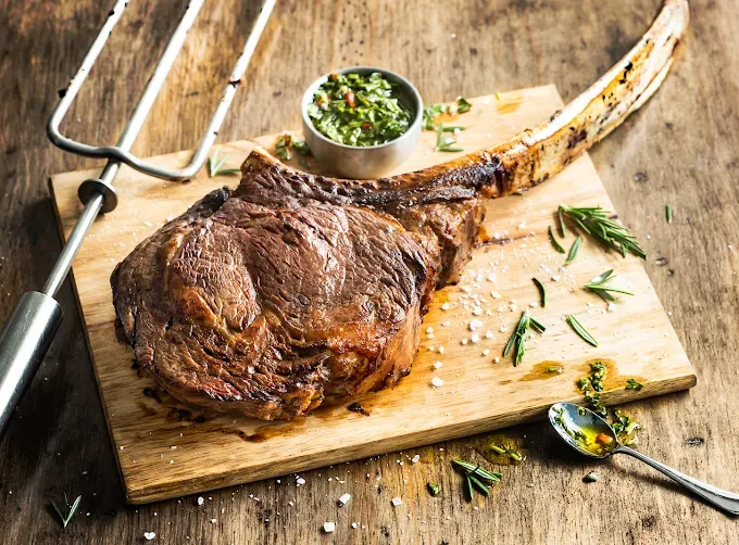 Dry-aged Tomahawk Ancho (ribeye) at Fogo de Chao